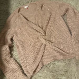 Pink sweater with white pearls